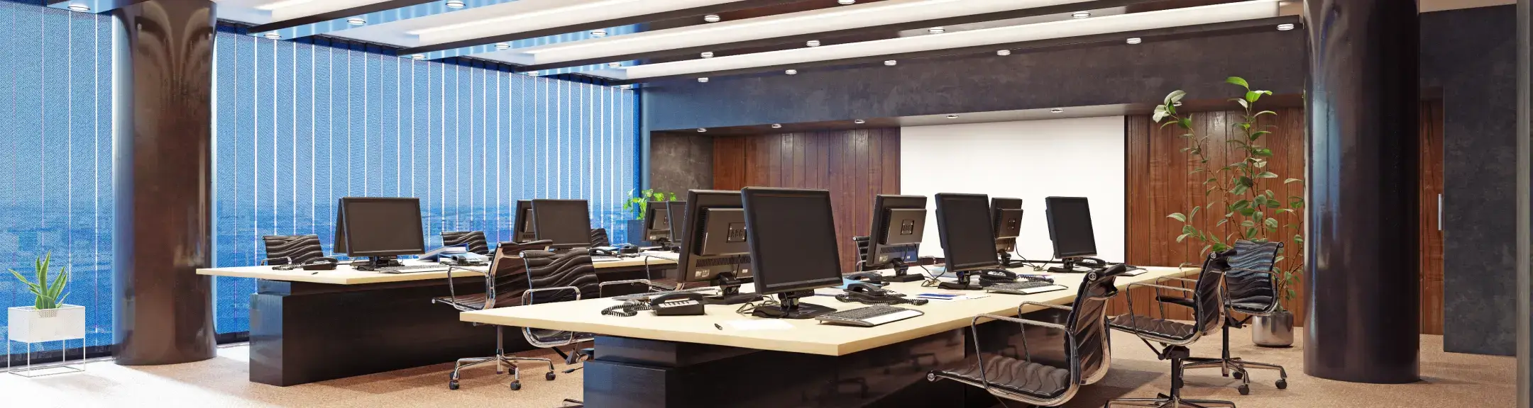 Office interior designers in Kolkata creating modern workspaces with ergonomic desks and computers